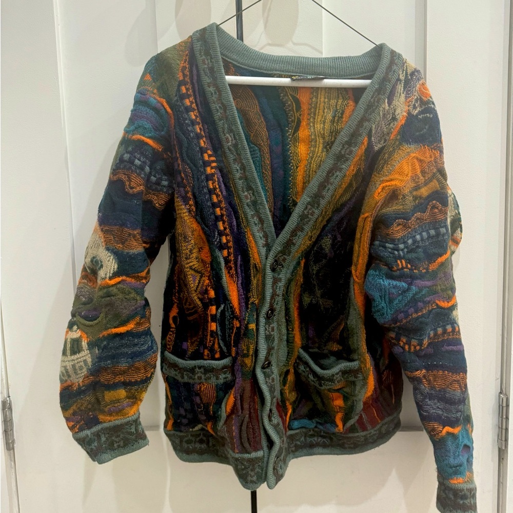 COOGI authentic thick sweater! Perfect condition. Size small but fits like a L